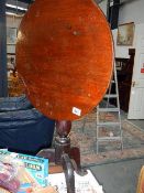 A Victorian mahogany tip up table