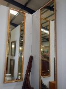 2 Long gilded framed mirrors