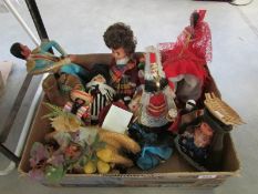 A box of costume dolls