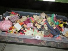 A box of costume dolls