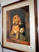 A framed & glazed picture of dogs