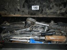 A box of spanners etc.