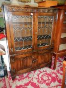 A leaded glazed top pyre bookcase