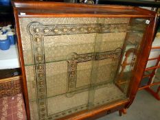 An Edwardian glazed cabinet