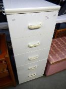 A white 5 drawer chest