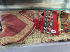 A quantity of table runners etc