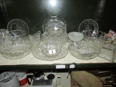 A shelf of glass ware