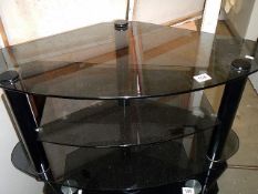 A black glass TV stand