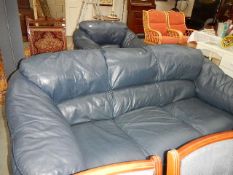 A grey 3 seater settee & armchair