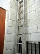 An alluminium ladder approximately 2 x 12"