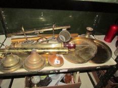 A shelf of brass and copper