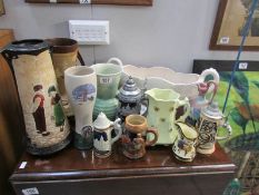 A mixed lot of vases, jugs,