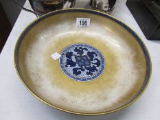 A Losal ware bowl with flow blue centre