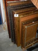 A quantity of old picture frames
