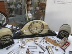 An art deco marble clock garniture