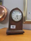 An Edwardian inlaid steeple mantel clock