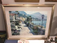 A framed and glazed continental scene print