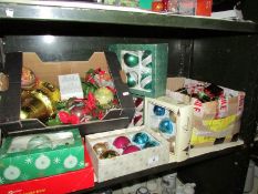 A shelf of Christmas decorations