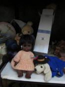 A quantity of dolls and soft toys