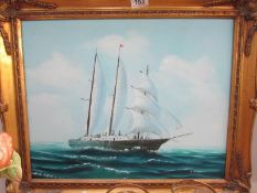 An oil on canvas study of a ship in full sail