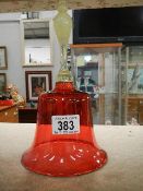 An old cranberry bell