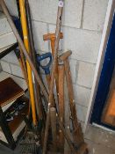 A quantity of old garden tools