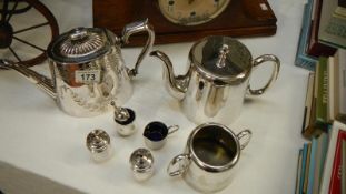 3 pieces of silverplate teaware and 4 condiment items