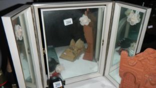 A triple dressing table mirror