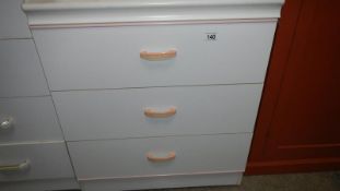 A 3 drawer white chest of drawers