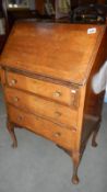 A 1930s desk with Queen Anne legs