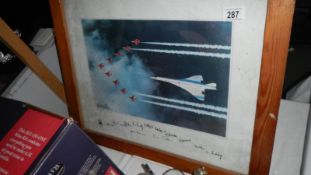 A good picture of Concorde with the Red Arrows - all signed
