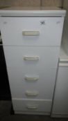 A 5 drawer white chest of drawers