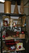 4 shelves of Christmas decorations and items