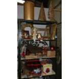 4 shelves of Christmas decorations and items