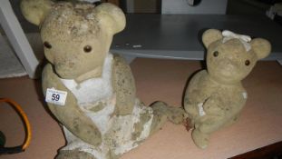 2 garden teddy bears
