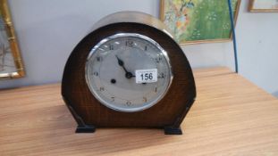 An Enfield mantel clock with key and pendulum