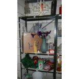 3 shelves of Christmas decorations and items