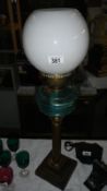 A Victorian oil lamp