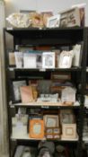 4 shelves of assorted picture frames
