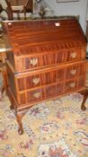 A 1930s desk with Queen Anne legs