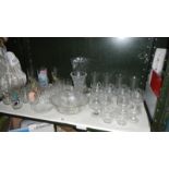 A shelf of glassware