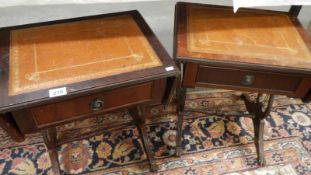 A pair of drop leaf one drawer tables with leather panel tops