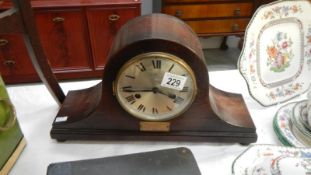 A Napoleon hat mantel clock