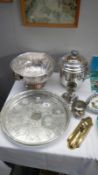 A silverplate punch bowl, ice bucket, tray,