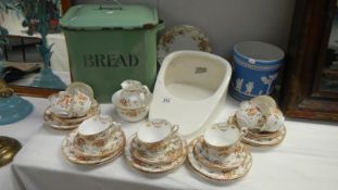 An enamel bread bin, a Radford tea service consisting of 38 pieces,