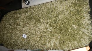 A green woollen rug