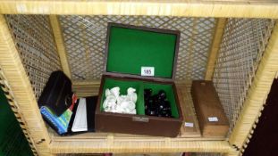 A quantity of playing cards, dominoes & chess pieces etc.