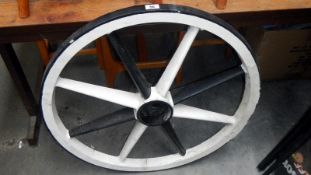 An old cart wheel