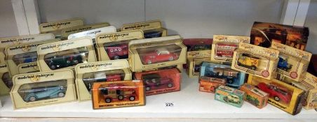 A quantity of booked Matchbox & Lledo models