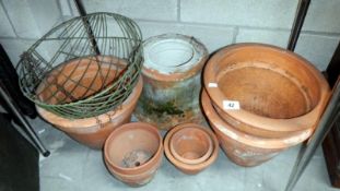 A quantity of terracotta pots